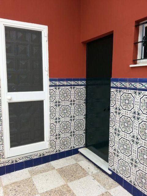 Back door to the kitchen & door to the washroom